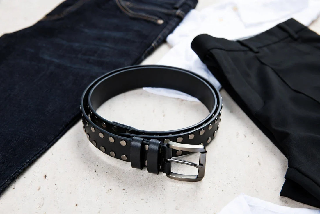 Black leather studded belt styled with denim and tailored wardrobe pieces for a fit check guide