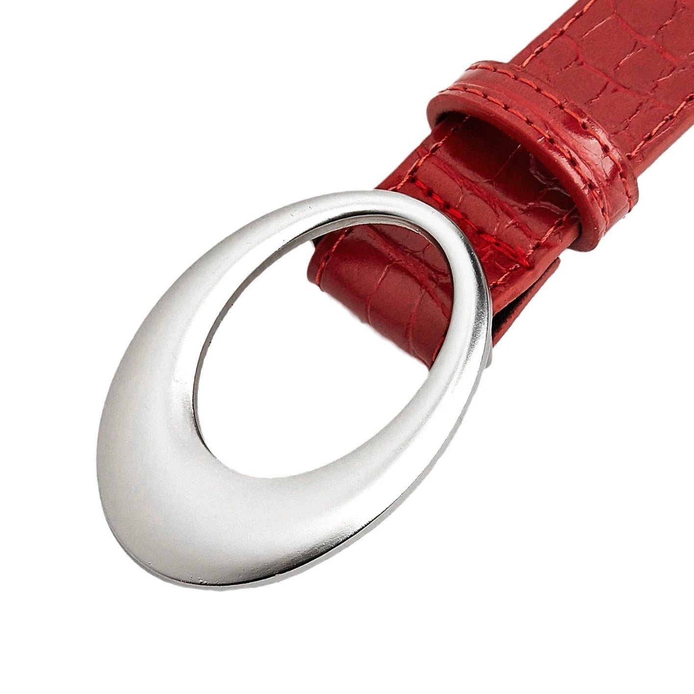 Close-up of the oval buckle and croc-embossed strap on a red casual belt