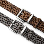 Brown and grey leopard belts with square silver-tone buckles on a white background