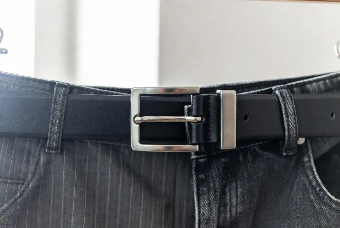 Designer belt styled with tailored trousers and denim to compare use cases
