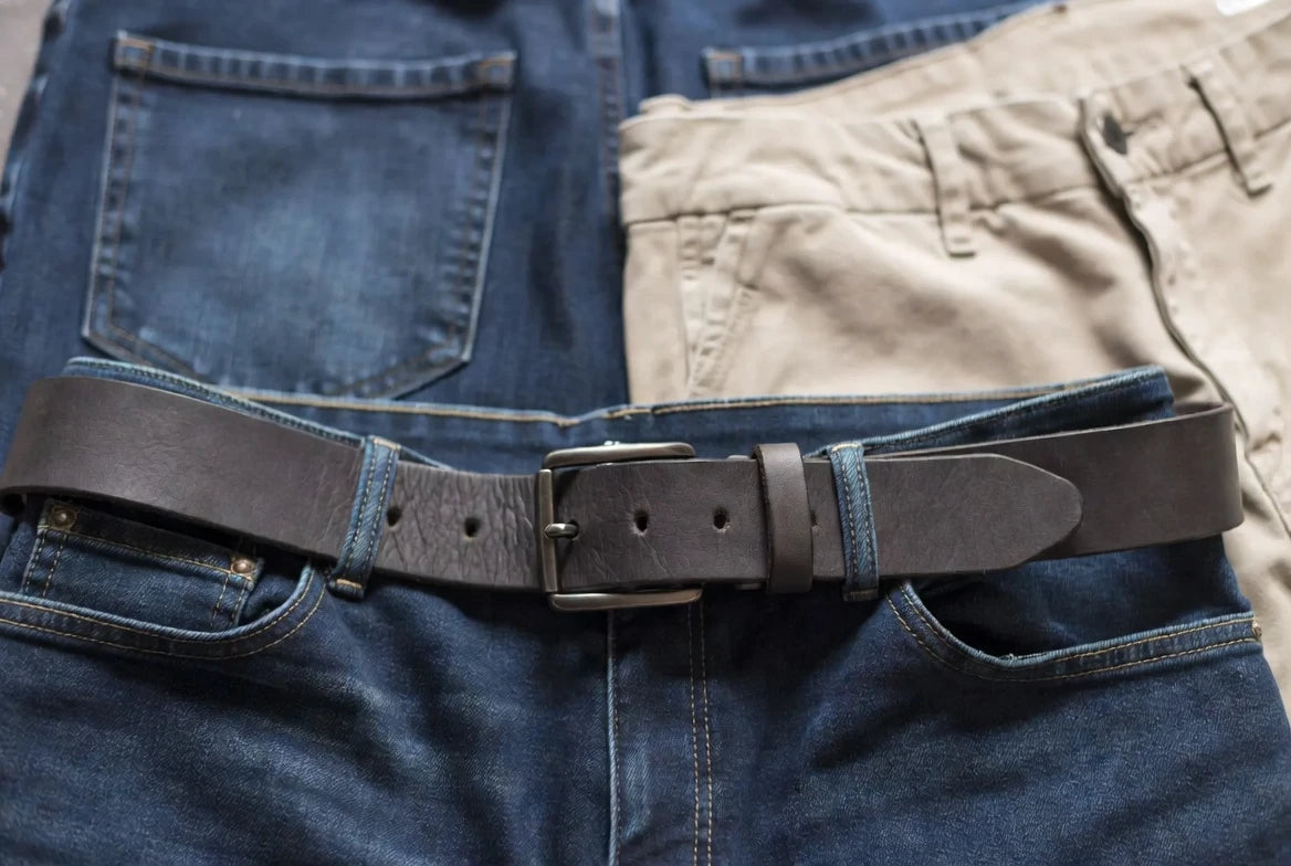 Casual belt fit showing correct tail length and buckle placement with jeans and chinos