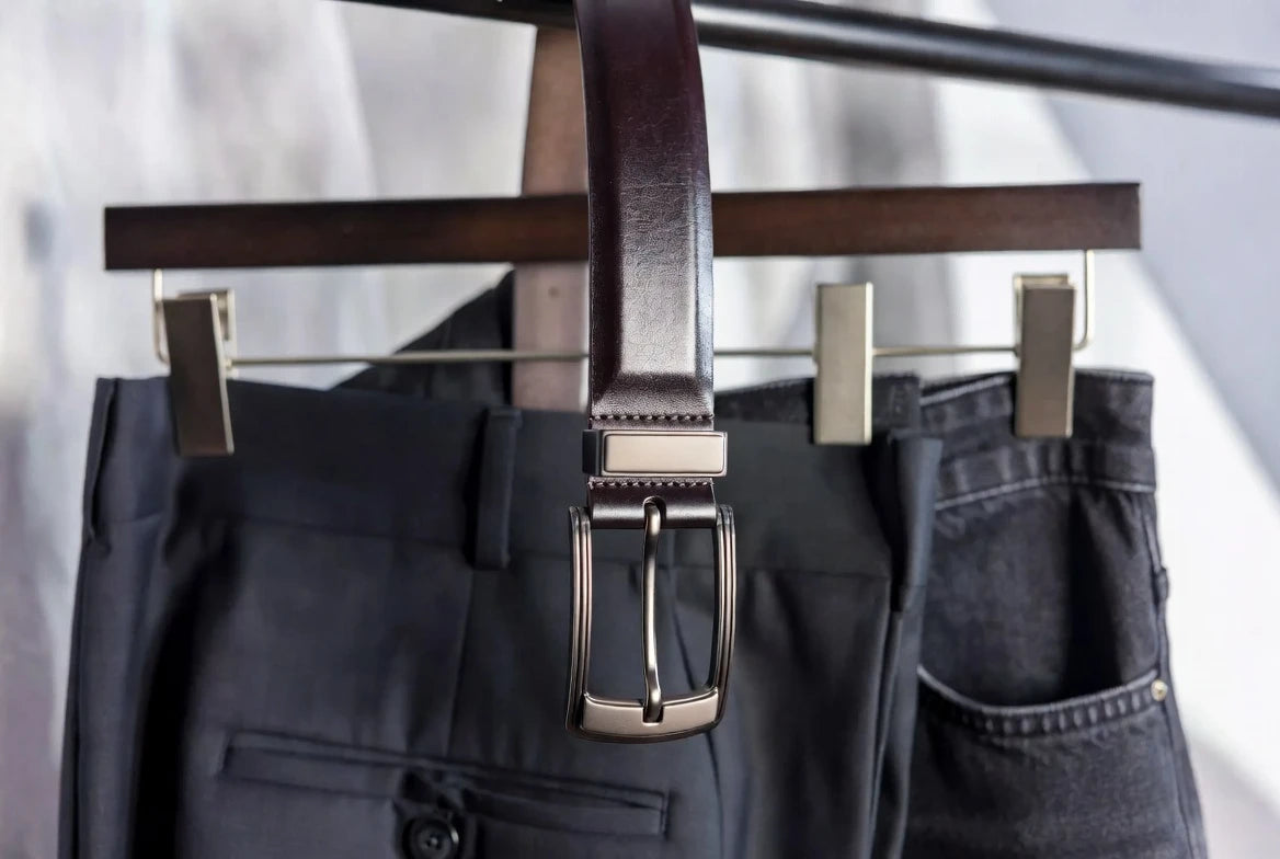 Leather belt styled with tailored trousers and denim to show versatile long-term wear use AI Prompt: