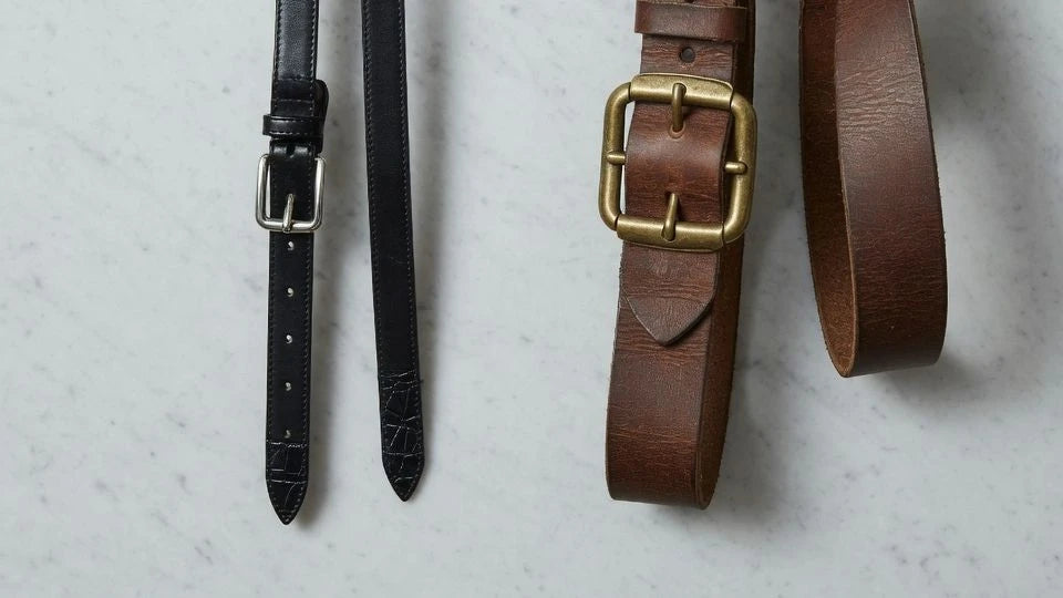 Comparison of slim dress belt storage and wider casual belt storage on different hanger types