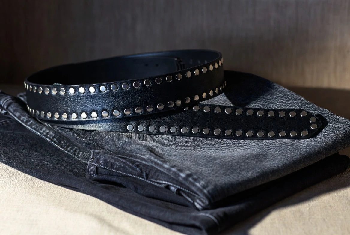 Studded belt widths compared with denim and tailored trousers